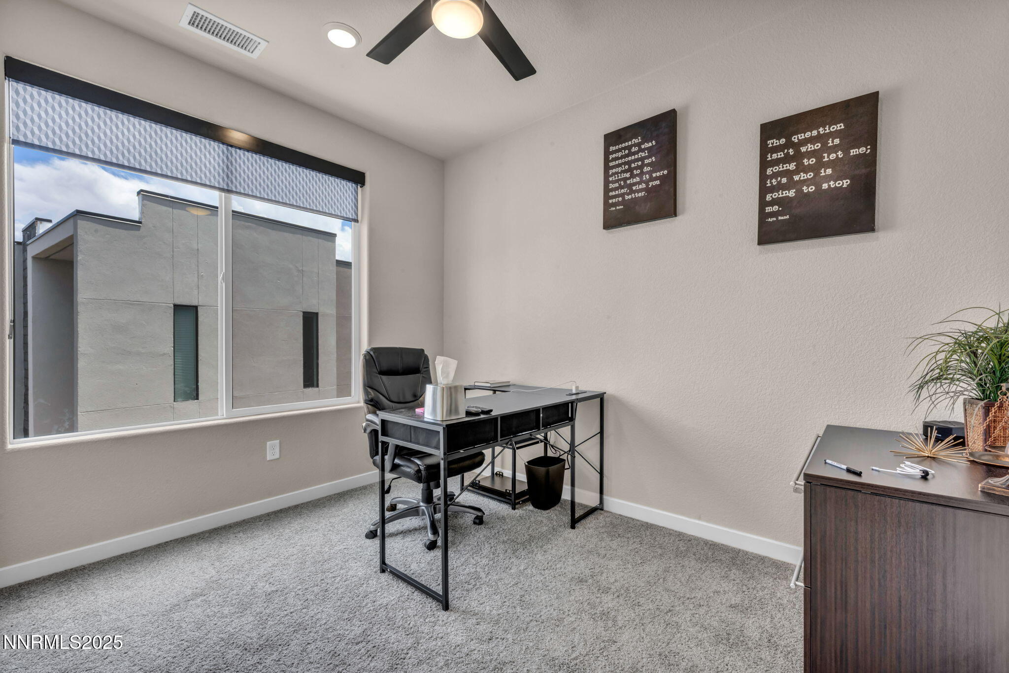150 Rissone Lane Reno, NV 89503 - Photo 21 of 53 a view of a workspace with furniture and a window