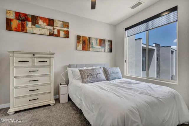 a bedroom with a bed and a walk in closet