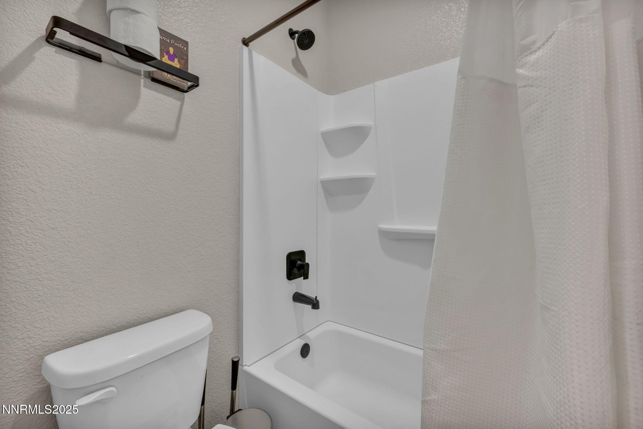 150 Rissone Lane Reno, NV 89503 - Photo 35 of 53 a bathroom with a toilet and a bathtub