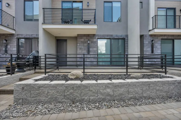 a view of a house with small yard