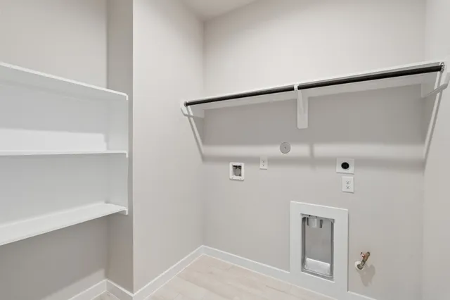 a front view of a house with yard porch and a yard