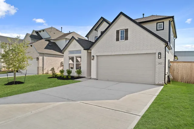 a view of a sign board with a big yard