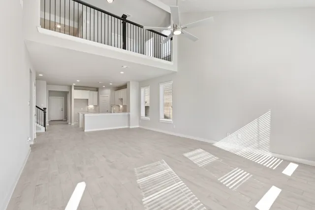 a view of a hallway with staircase