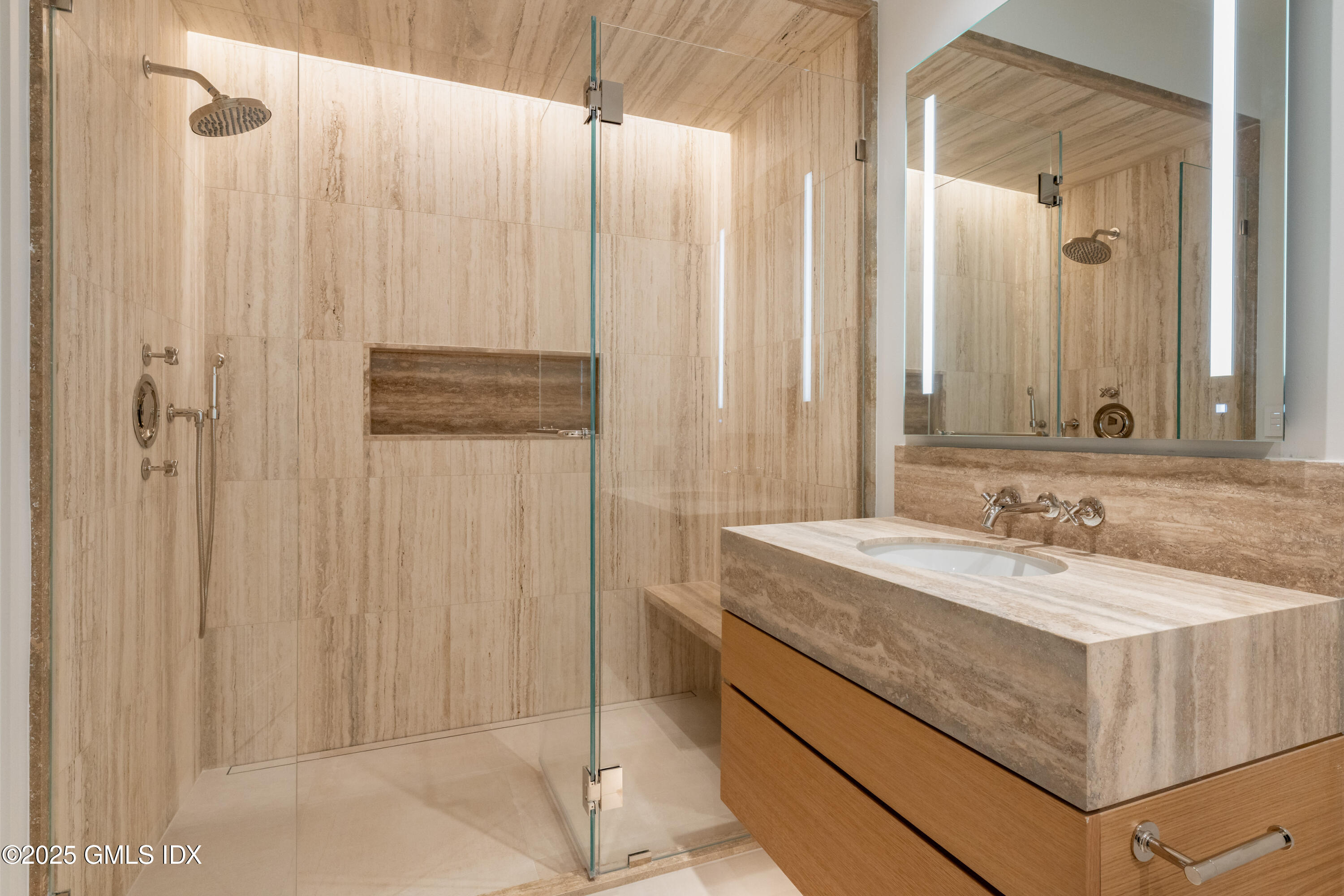 214 Clapboard Ridge Road Greenwich, CT 06831 - Photo 2 of 7 a bathroom with a sink and a mirror