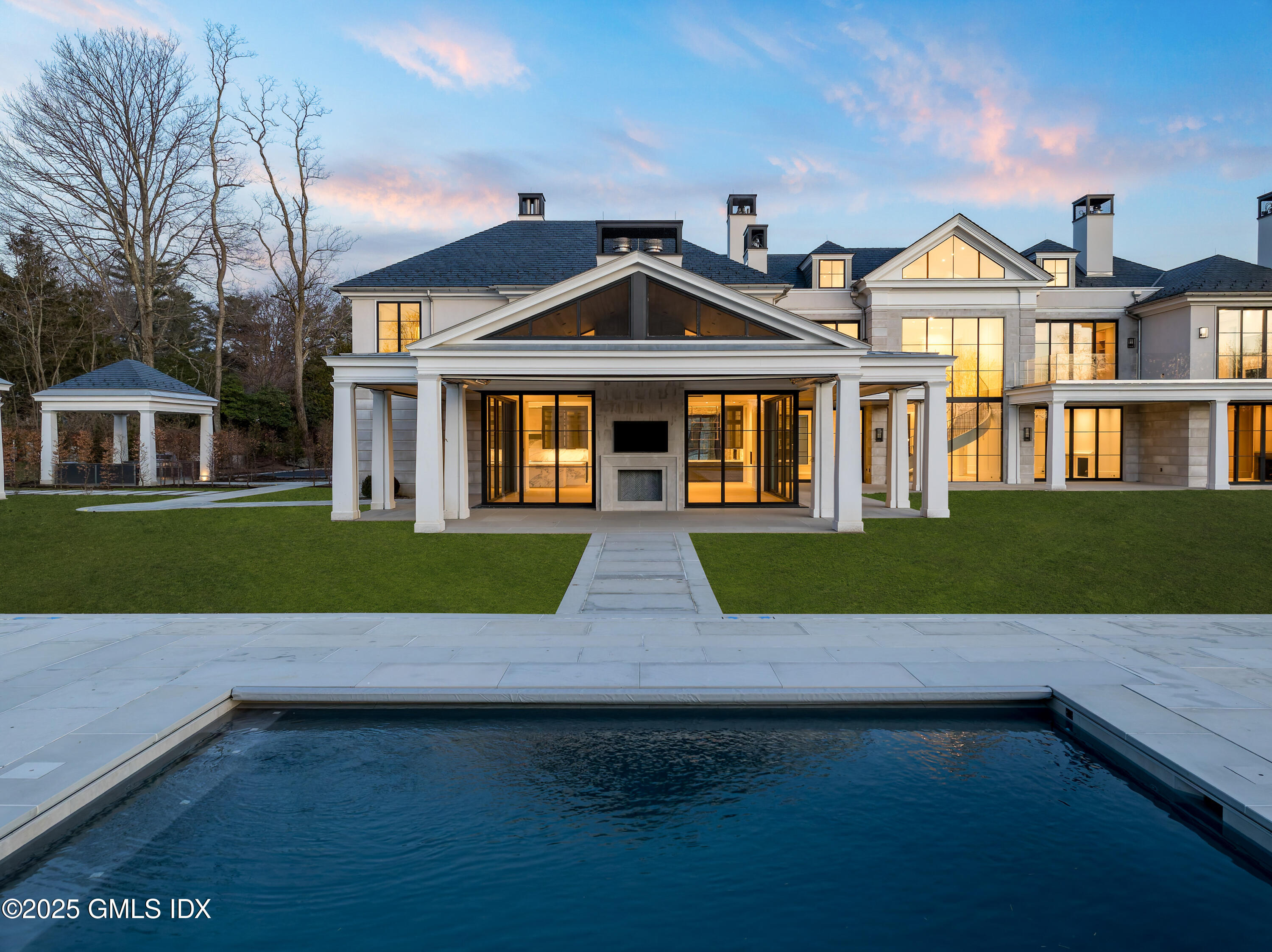 214 Clapboard Ridge Road Greenwich, CT 06831 - Photo 7 of 7 a view of front of house with a yard