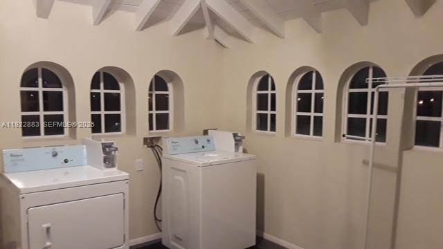 119 Cibao Court, Unit 3 Coral Gables, FL 33134 - Photo 4 of 9 a view of a sink storage and utility room with washer and dryer