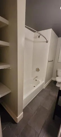 a bathroom with a bathtub