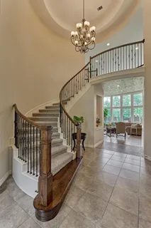 a view of entryway livingroom and hall