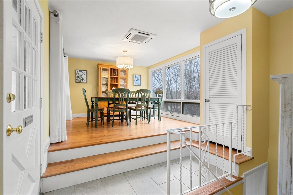 51 Winslow Road Reading, MA 01867 - Photo 13 of 40 a view of dining room with furniture and chandelier