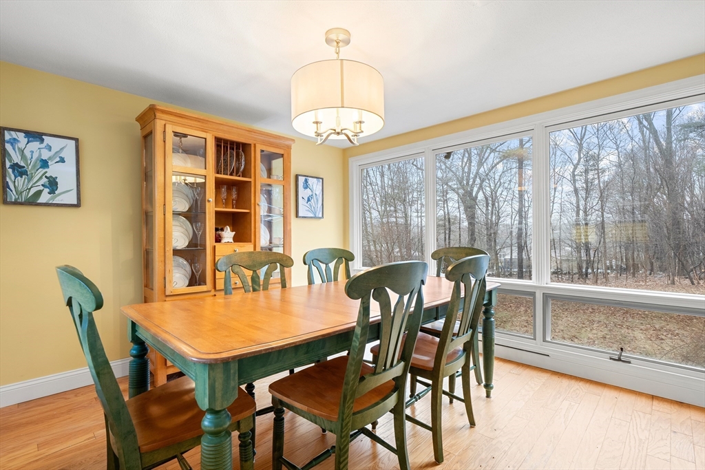 51 Winslow Road Reading, MA 01867 - Photo 15 of 40 a view of a dining room with furniture window and outside view