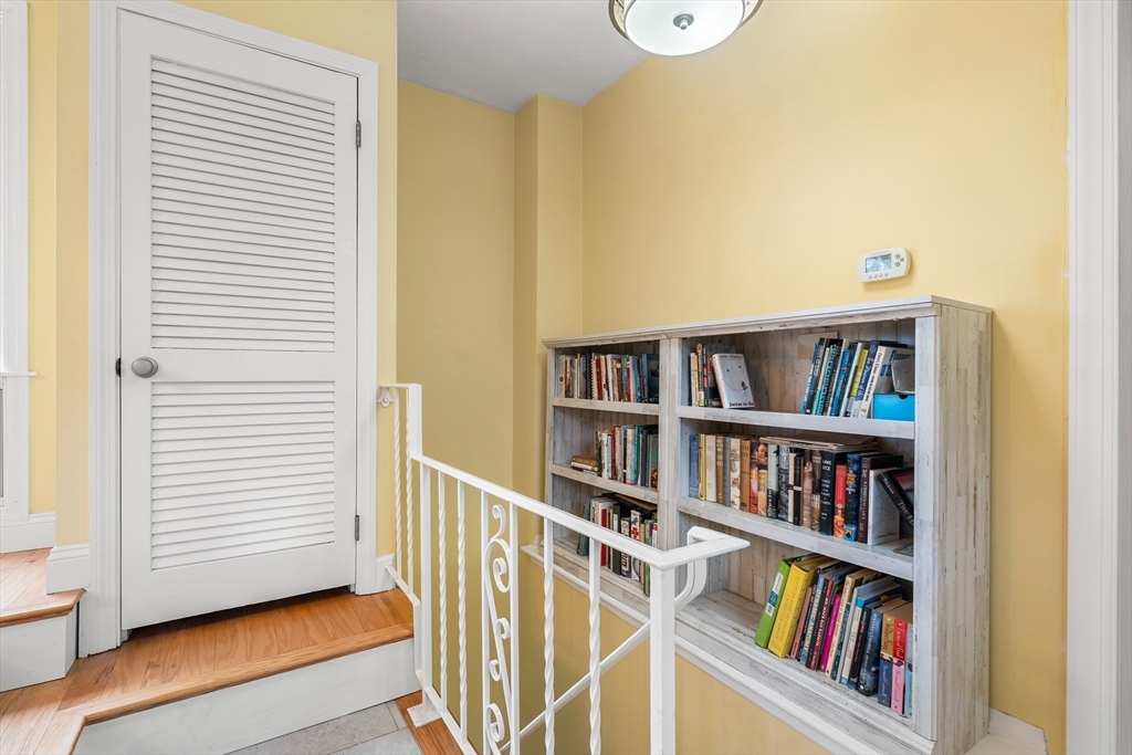 51 Winslow Road Reading, MA 01867 - Photo 16 of 40 a view of a hallway with closet