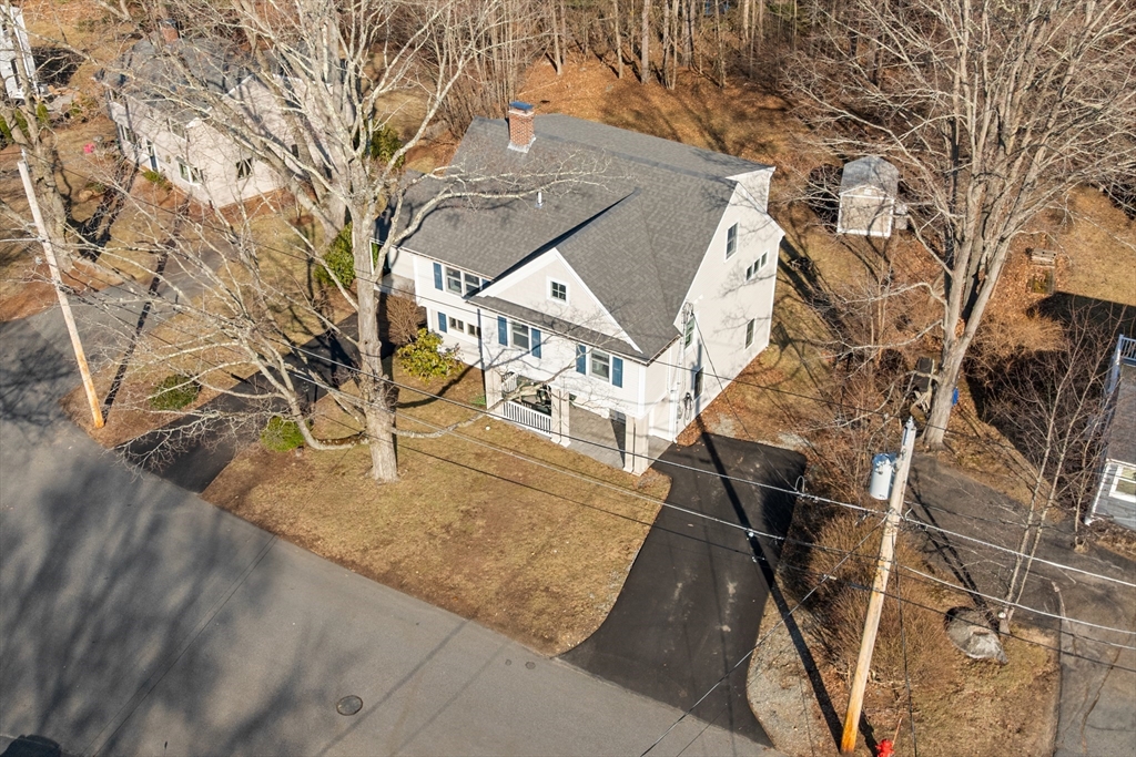 51 Winslow Road Reading, MA 01867 - Photo 3 of 40 a view of a house with a snow