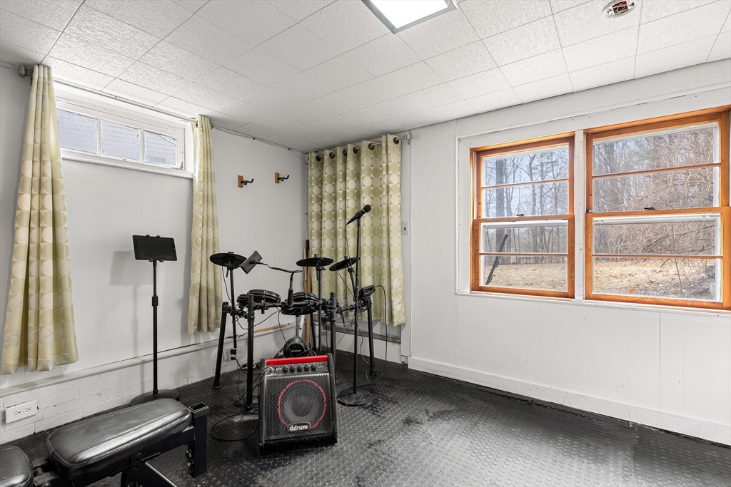 51 Winslow Road Reading, MA 01867 - Photo 32 of 40 a view of a room with gym equipment