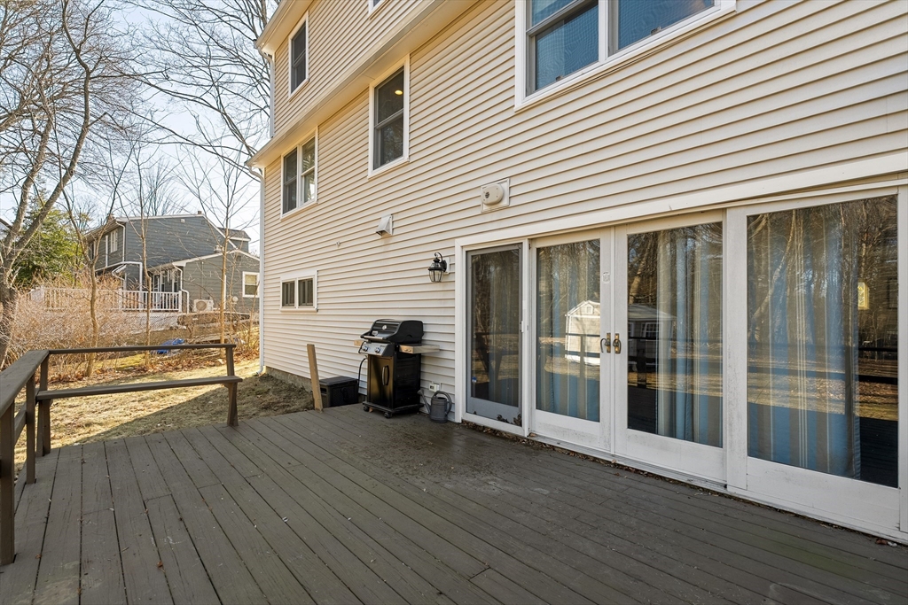51 Winslow Road Reading, MA 01867 - Photo 33 of 40 a view of a house with a large window