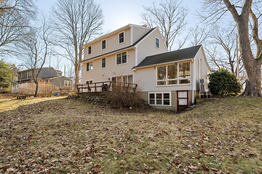 51 Winslow Road Reading, MA 01867 - Photo 35 of 40 a view of a house with a yard