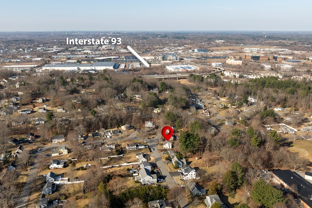 51 Winslow Road Reading, MA 01867 - Photo 37 of 40 an aerial view of residential building and parking space