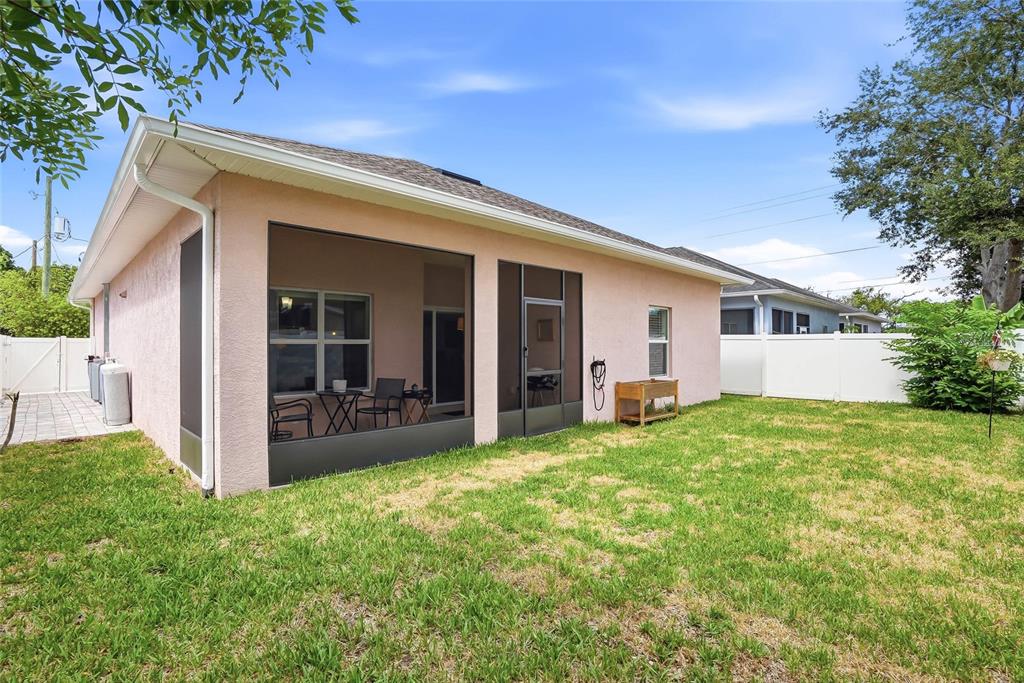 2906 West Douglas Street Tampa, FL 33607 - Photo 28 of 36 a view of a house with backyard