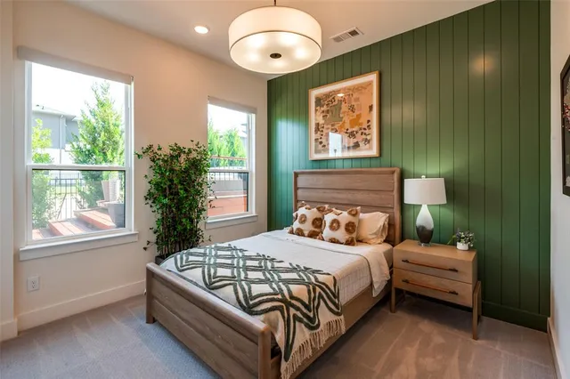 a kitchen with stainless steel appliances a stove and cabinets