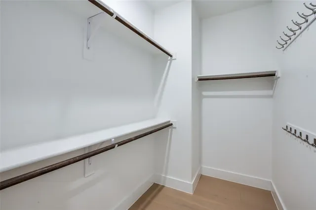 a kitchen with a sink and a counter top space