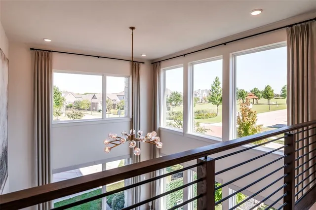 a view of living room with furniture and a large window