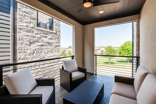 a view of room with window and furniture