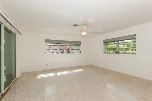 an empty room with windows