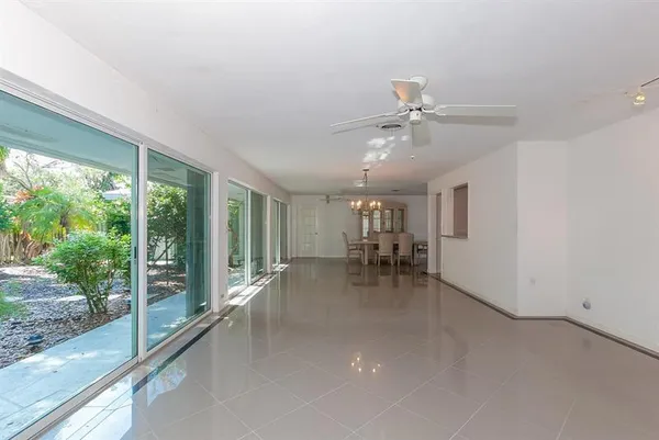 a view of a livingroom with furniture window and outside view