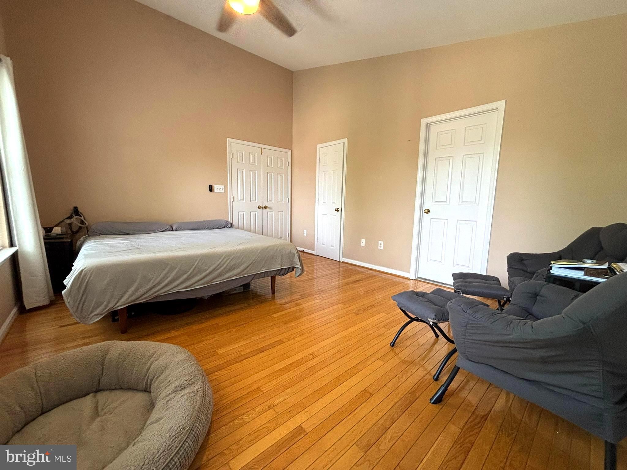 6659 Patent Parish Lane Alexandria, VA 22315 - Photo 16 of 16 a bedroom with a bed and a dresser