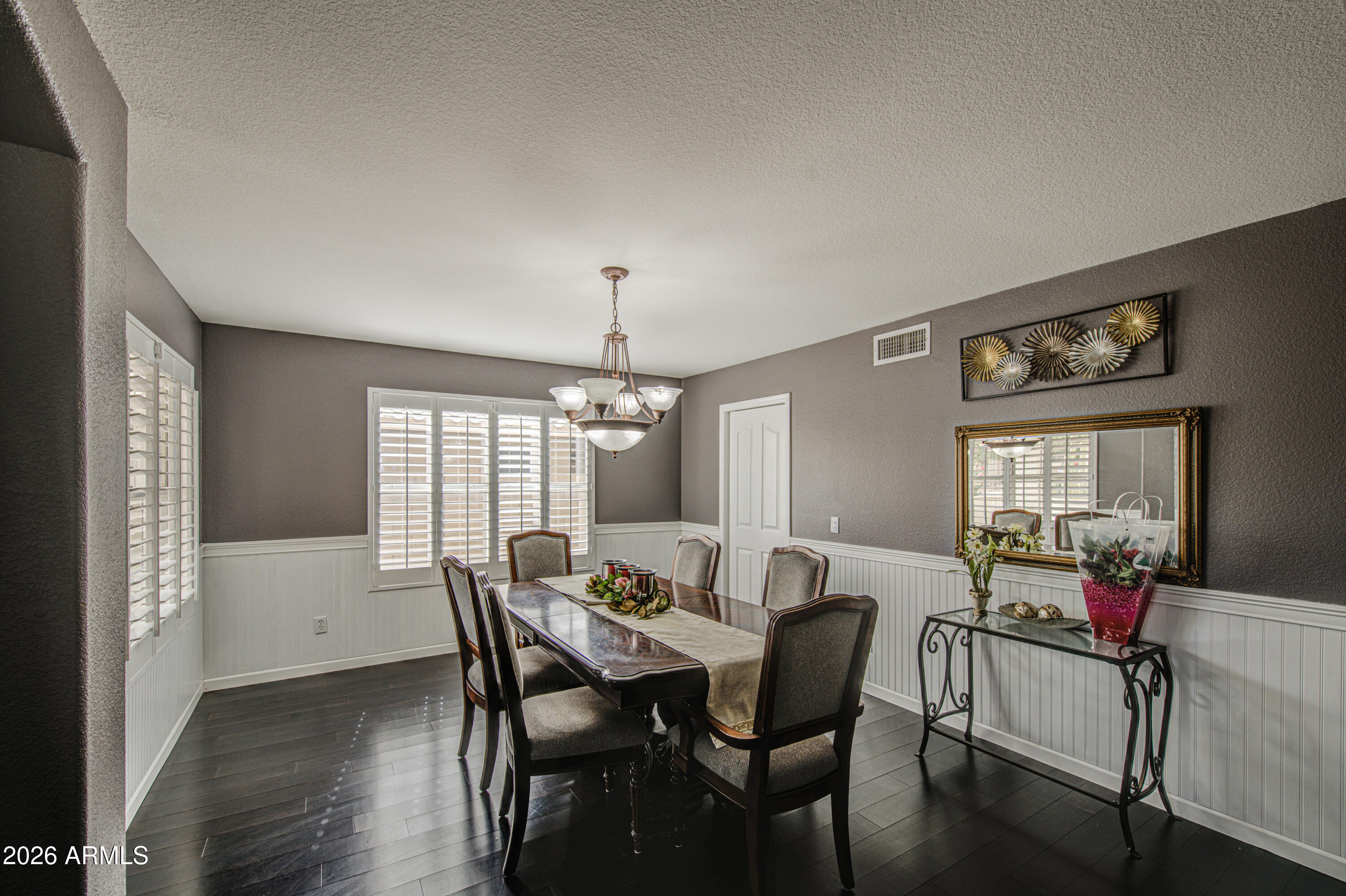 12403 West Monte Vista Road Avondale, AZ 85392 - Photo 10 of 63 a view of a dining room with furniture and window
