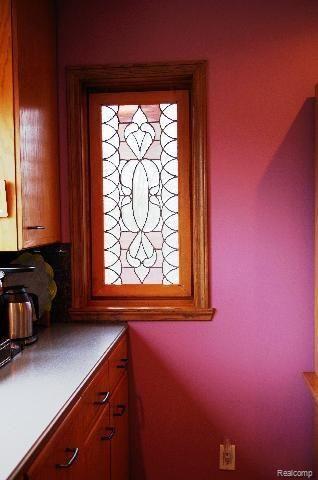 4938 Barber Road Metamora, MI 48455 - Photo 23 of 26 Stained glass window in kitchen.JPG
