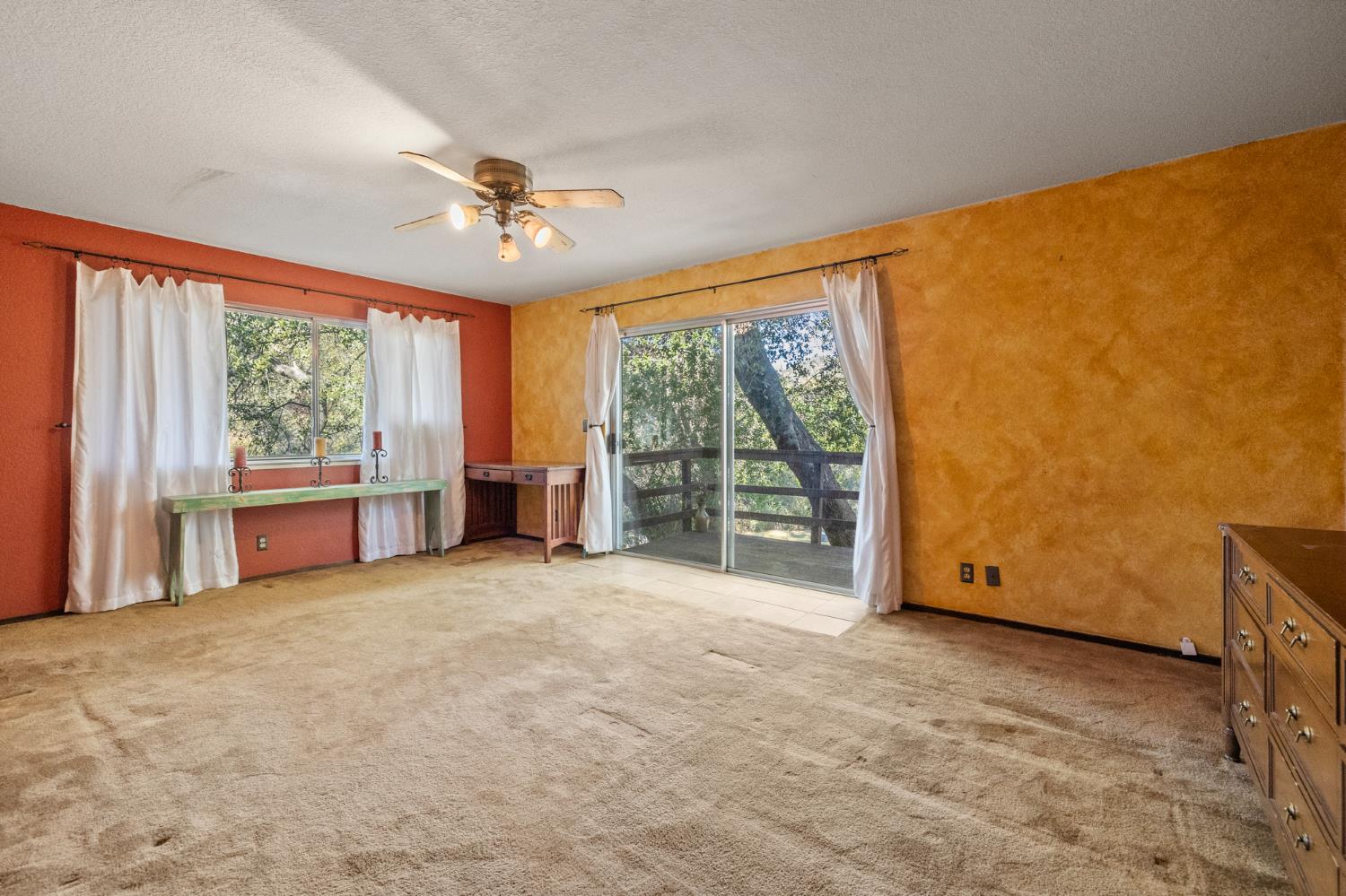 1480 Pennsylvania Gulch Road Murphys, CA 95247 - Photo 21 of 31 an empty room with windows and an outdoor view