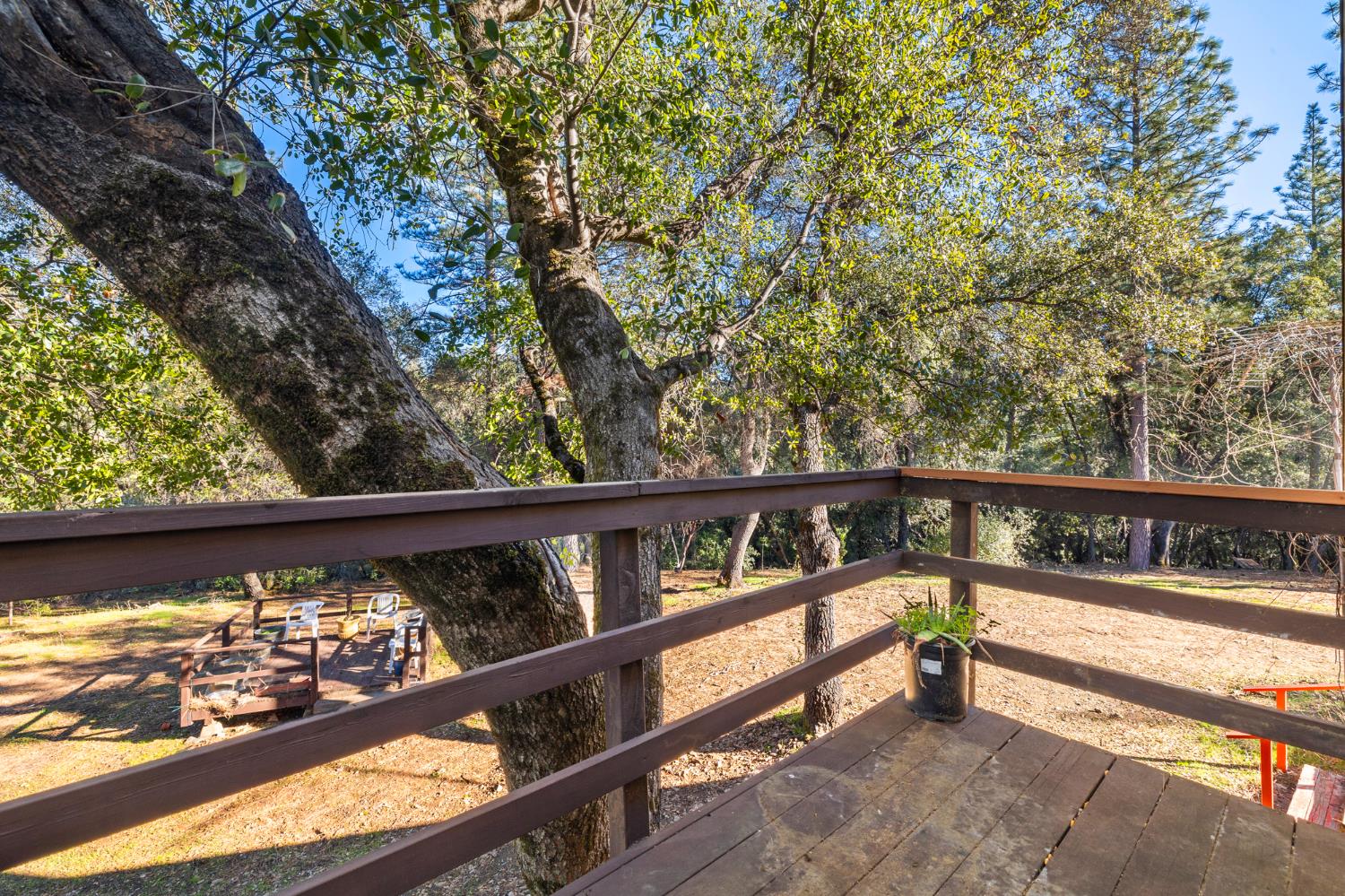 1480 Pennsylvania Gulch Road Murphys, CA 95247 - Photo 22 of 31 a view of a balcony with wooden floor