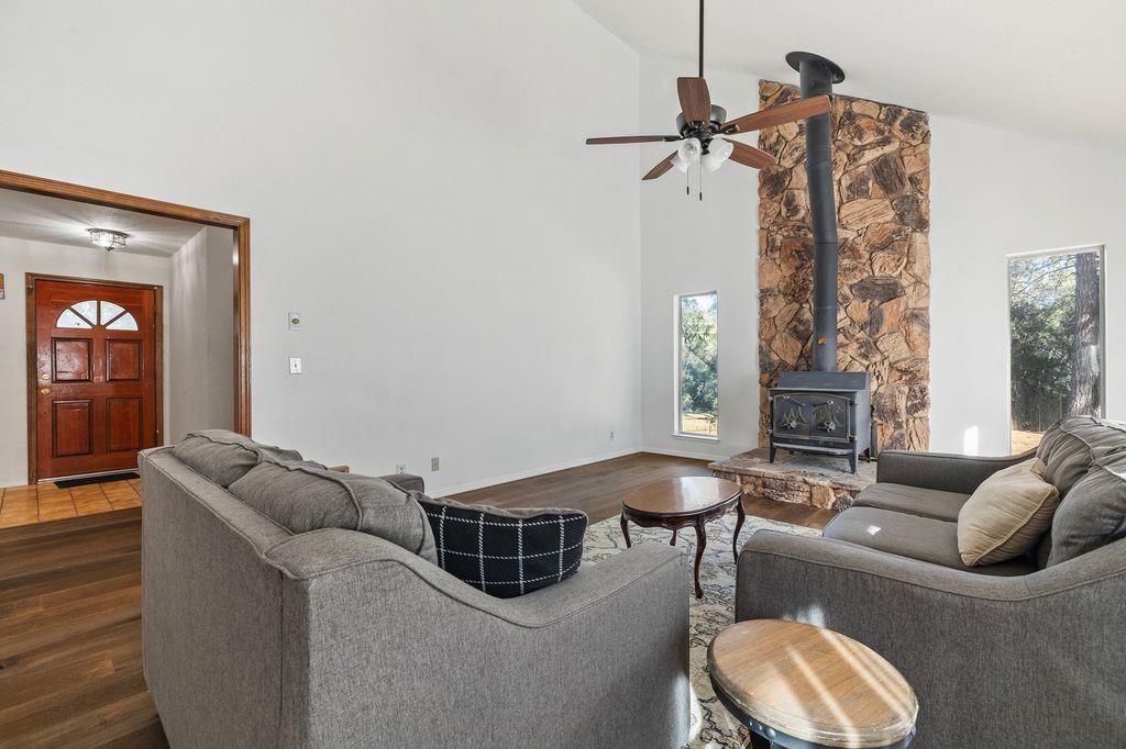 1480 Pennsylvania Gulch Road Murphys, CA 95247 - Photo 6 of 31 a living room with furniture and a fireplace