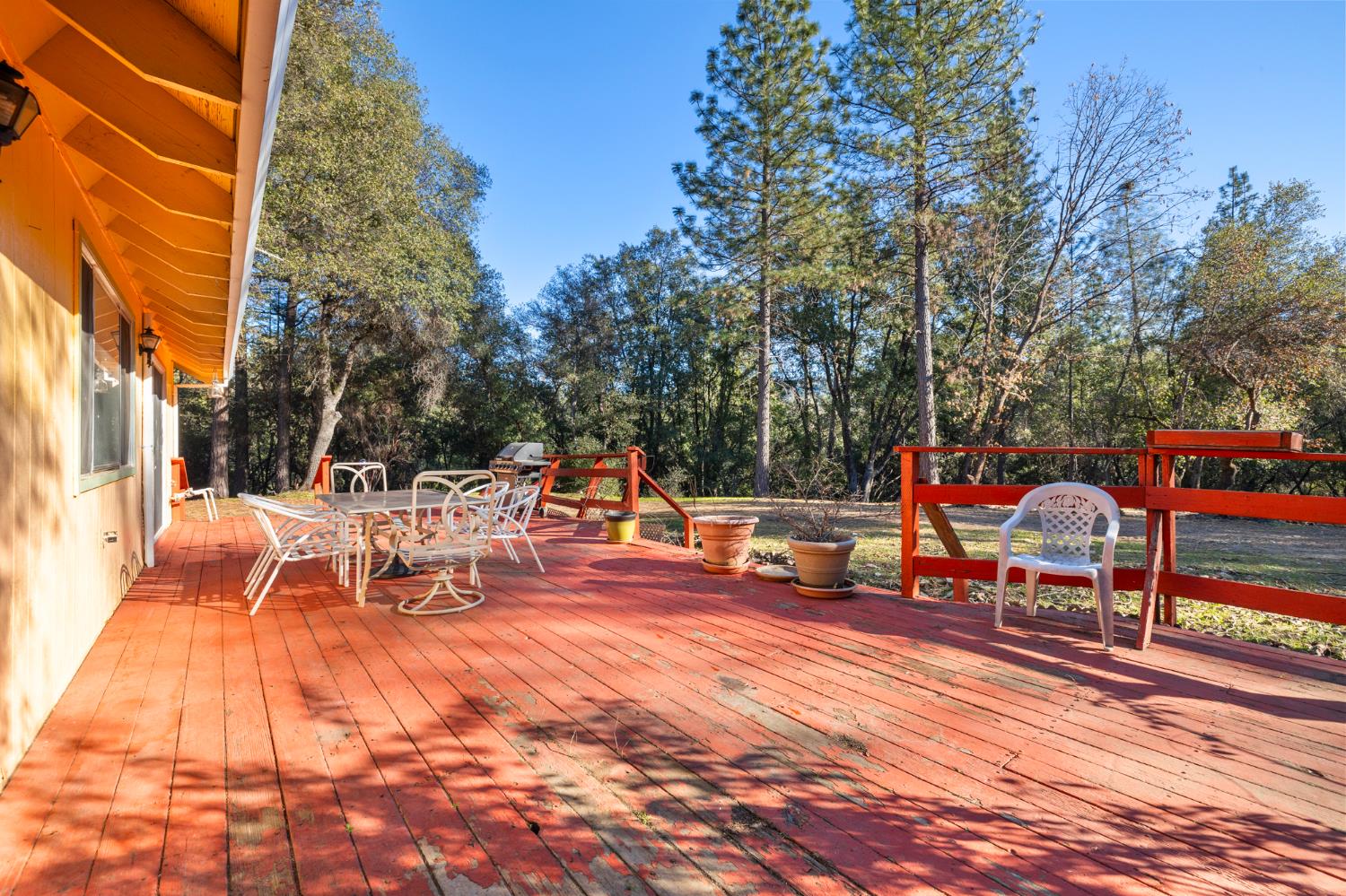 1480 Pennsylvania Gulch Road Murphys, CA 95247 - Photo 7 of 31 a view of a outdoor space with a table and chairs