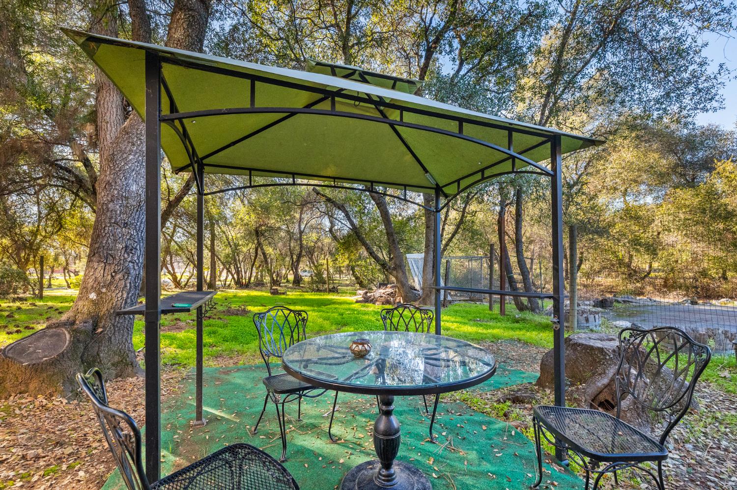 1480 Pennsylvania Gulch Road Murphys, CA 95247 - Photo 10 of 31 a view of backyard with seating area and green space