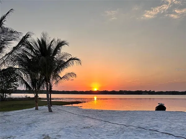 a view of a lake with a beach