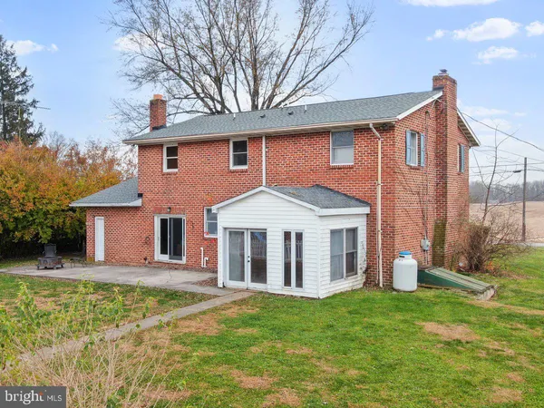 a house with garden in front of it