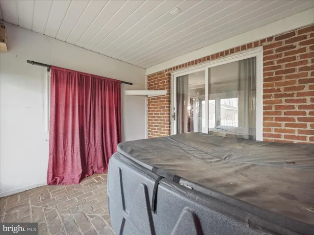 a view of a livingroom with furniture and window