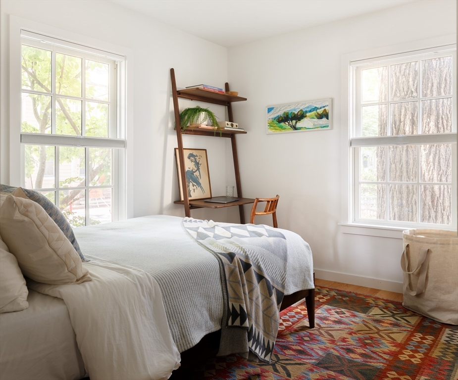 20 Brown Street Cambridge, MA 02138 - Photo 15 of 21 a bedroom with a bed and a window
