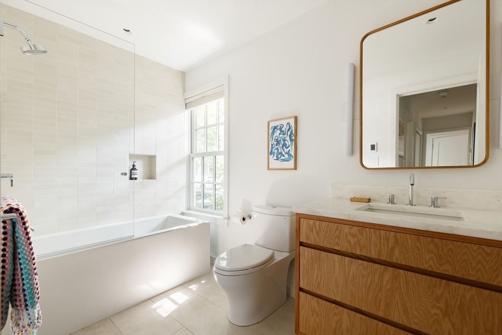 20 Brown Street Cambridge, MA 02138 - Photo 16 of 21 a bathroom with a toilet a sink and bathtub