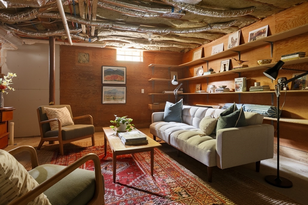 20 Brown Street Cambridge, MA 02138 - Photo 18 of 21 a outdoor living room with furniture and a air conditioner