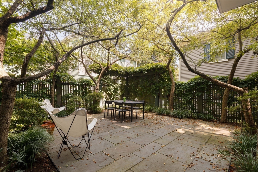 20 Brown Street Cambridge, MA 02138 - Photo 19 of 21 a view of a tables and chairs on the deck