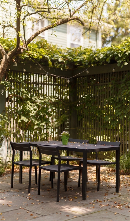 20 Brown Street Cambridge, MA 02138 - Photo 20 of 21 a view of a chairs and table on the terrace