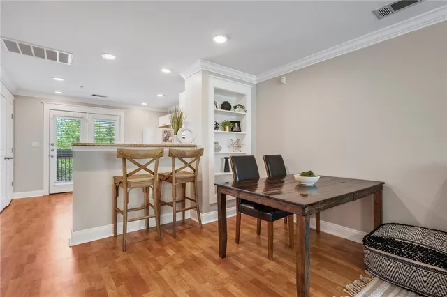 a workspace with furniture and wooden floor