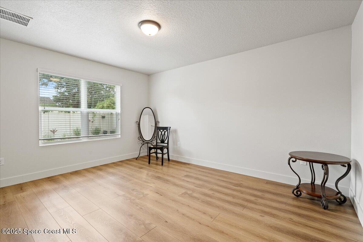 1120 Swiss Pointe Lane Rockledge, FL 32955 - Photo 13 of 47 a view of a workspace with furniture and a window