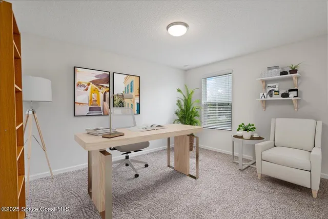 a living room with furniture and window