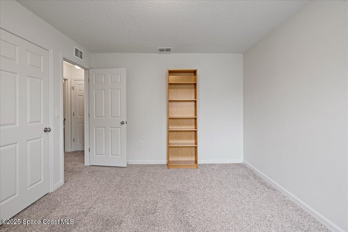 1120 Swiss Pointe Lane Rockledge, FL 32955 - Photo 25 of 47 a view of an empty room