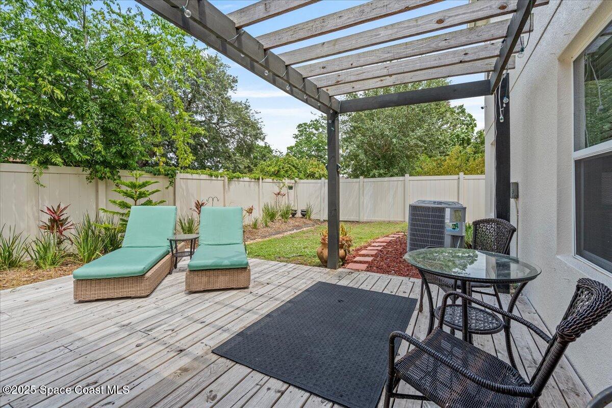 1120 Swiss Pointe Lane Rockledge, FL 32955 - Photo 41 of 47 a patio view with a seating space
