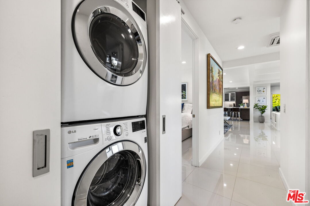 71581 Halgar Road Rancho Mirage, CA 92270 - Photo 43 of 46 a view of a hallway with washer and dryer
