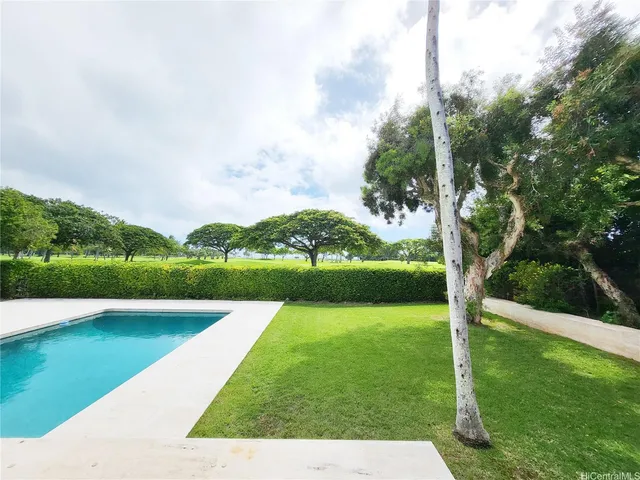 a view of a golf course with a garden